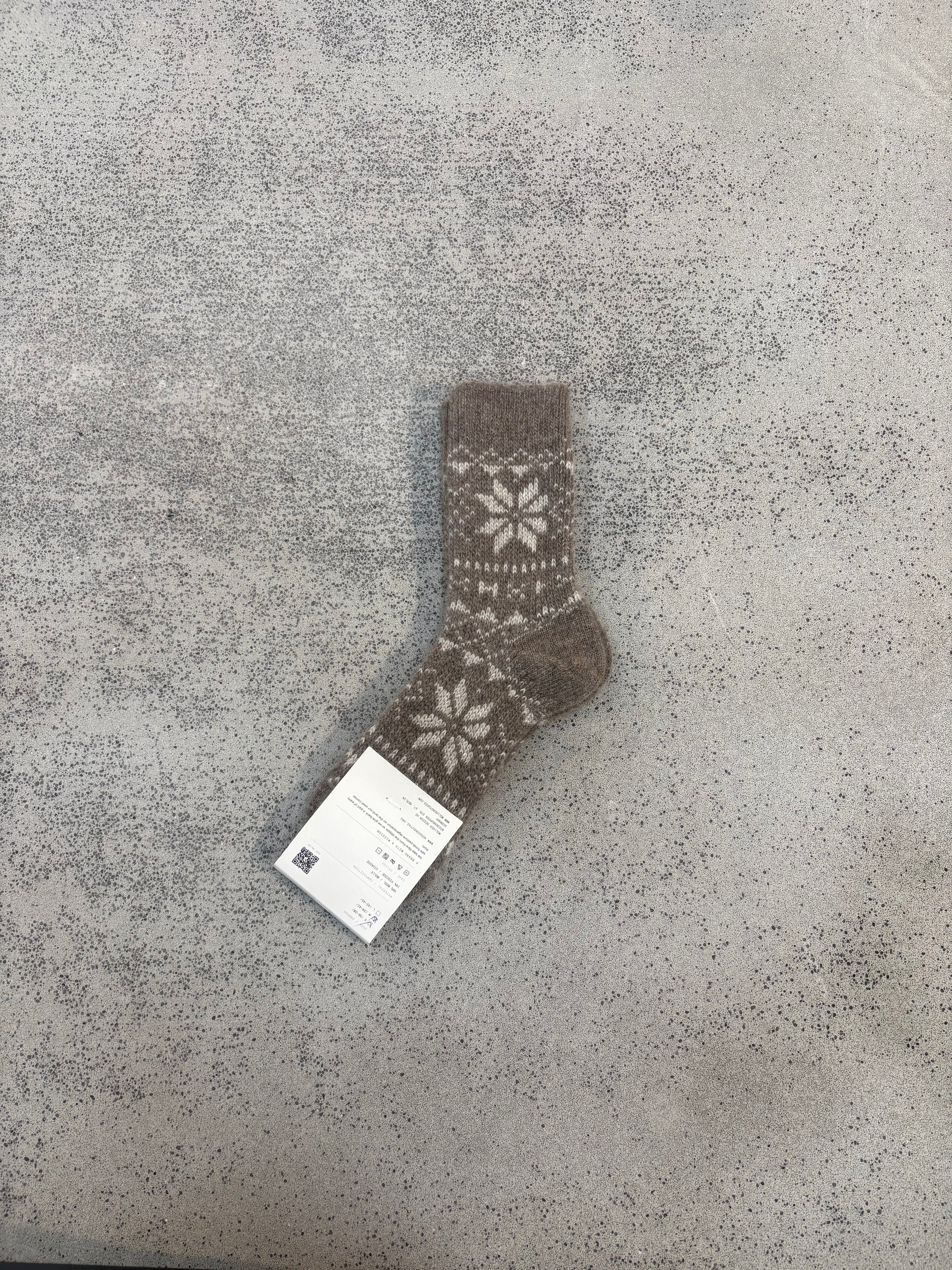 Wollsocken Schneemuster